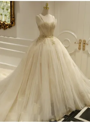 Champagne Ball Gown Tulle Spaghetti Straps Backless Wedding Dresses
